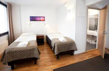 Фото номера Двухместный номер с 2 отдельными кроватями Отель Hotel Alvariini г. Alajärvi 4